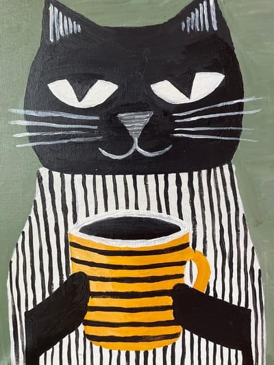 An acrylic painting depicts a stylized black cat wearing a striped shirt and holding a striped mug. The cat has white triangular eyes, white whiskers, and white marks on its ears. The shirt is black and white striped, and the mug is yellow and black striped with an orange handle. The background is a muted green. The painting appears to be a decorative piece, likely displayed indoors. The location in Kozitsino, Russia is not evident from the image itself.