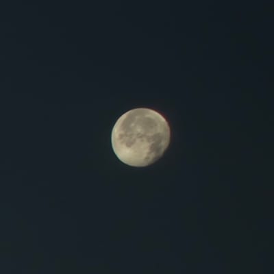 The image shows a nearly full moon against a dark, clear night sky. The moon is illuminated from the right, with craters and surface features visible. There are no people, objects, or any indication of the city of Gurb, Spain, within the frame of the image. The scene is solely focused on the celestial body.