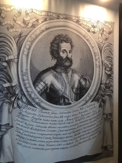The image is a detailed engraving of Petrus, Count of Savoy. He is depicted in a circular frame, wearing armor and a beard. The text surrounding the portrait identifies him as Petrus Thomæ filius, Comes XII. Chablasy, and other titles. The engraving includes decorative elements such as ribbons, foliage, and elaborate border designs. The text is written in Latin. The artist and engraver are identified as F.I.D. Lange del. and Pet. Giffart Sculptor regius Sculp. Parisys. The image does not appear to be located in Veytaux, Switzerland.