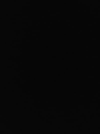 The image is completely black. There are no discernible objects, shapes, or patterns visible. The darkness is uniform throughout the entire frame.