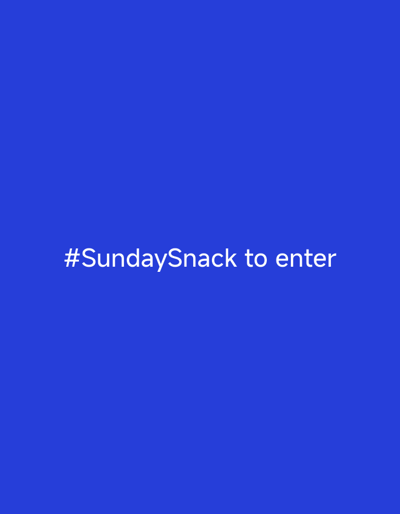 The image displays a solid royal blue background with white text centered on the screen. The text reads "#SundaySnack to enter". There are no people, objects, or environmental details visible in the image, and no specific location within the city of Октябрьский Снт, Russia can be determined.