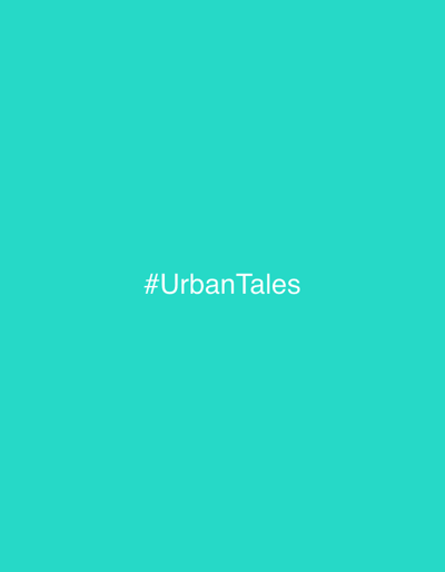 A solid turquoise background with the white text "#UrbanTales" in the center.