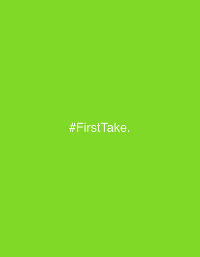 The scene, situated in Bangor, United Kingdom, presents a uniformly illuminated, solid lime green background. Centrally positioned on this background is the white text '#FirstTake.', rendered in a sans-serif typeface, followed by a period. No individuals, physical objects, discernible actions, or environmental features are present within the visual frame, which maintains a flat, monochromatic appearance.