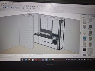The image shows a computer screen displaying a 3D rendering of a kitchen design. The design includes cabinets, countertops, a sink, a stove, and an oven. A library of materials and textures is visible on the right side of the screen, with options such as "368 Creamy Desert," "381 Creamy Leather," and "736 Blue Ocean." The operating system's taskbar is at the bottom, showing the time as 00:14 and the date as 30.06.2024, with a weather indicator showing 21°C and "Mostly cloudy." The file path at the top of the screen indicates the project is named "Minsk-Mir Alferova 14-103.sto," suggesting it's a design project for a kitchen in a location potentially related to Mir Alferova in Minsk, Belarus. There is no information to determine the location in Zhodzina, Belarus. The scene depicts a digital design process, not a physical location.