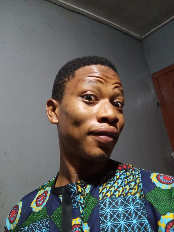 Man takes selfies in Oshogbo, Nigeria