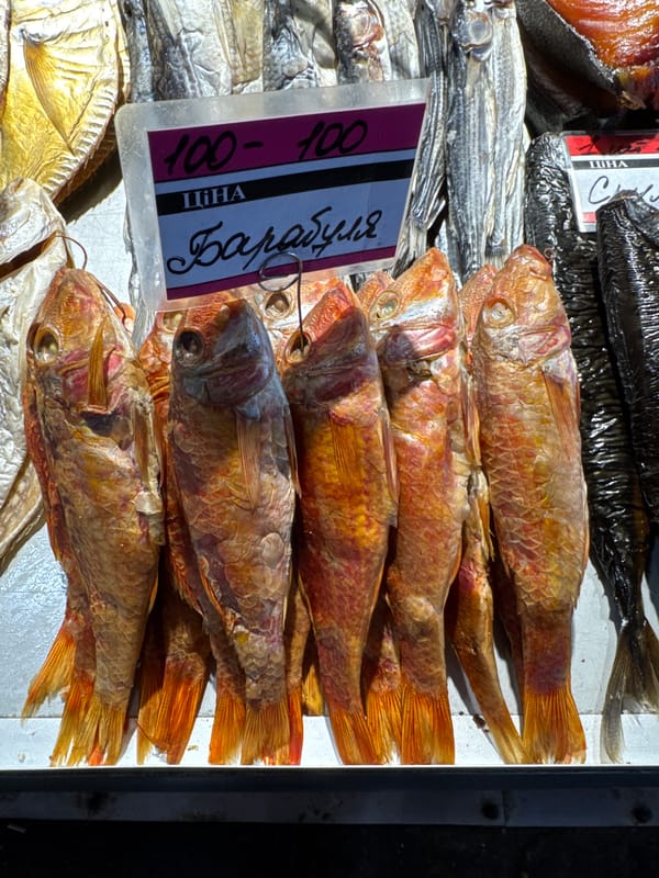 Summer market in Odesa: fish, fresh peppers, and watermelons