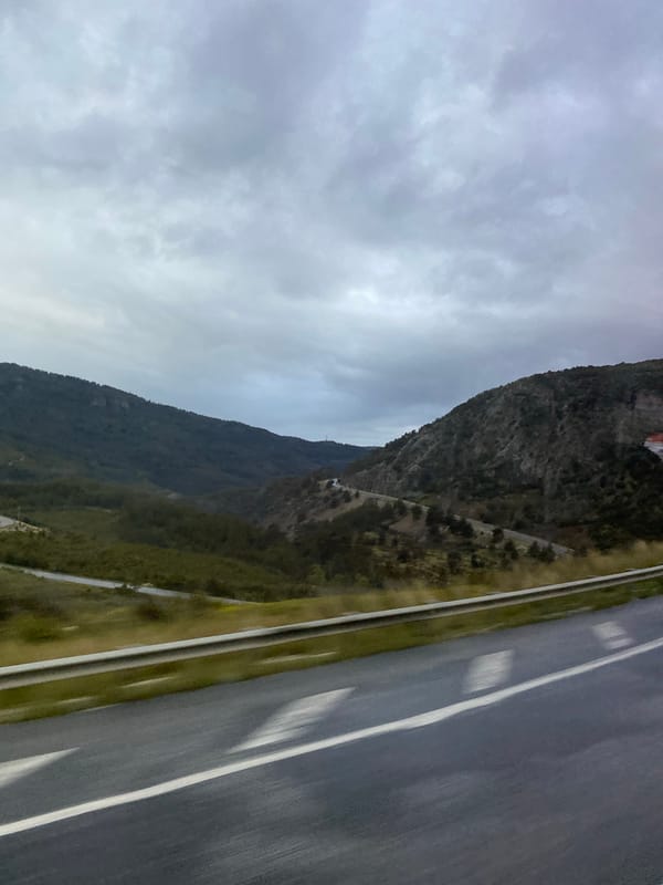 Mountain road observed under overcast skies in Manavgat