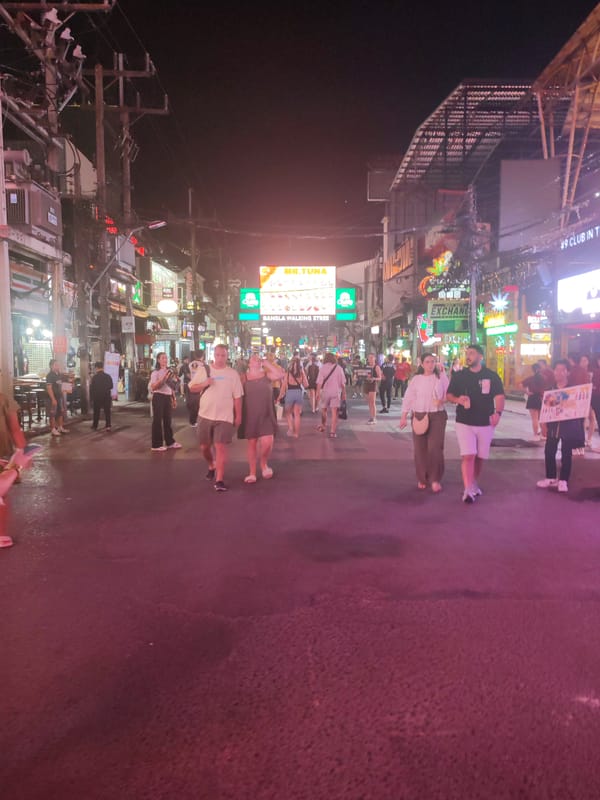 Daytime activity on Bangla Walking Street includes fitness classes