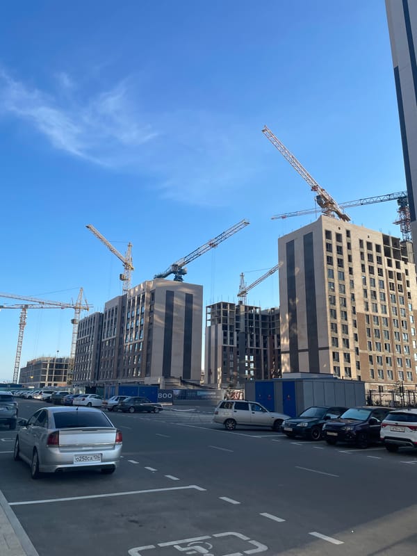 Stavropol high-rise construction site, multiple angles, midday