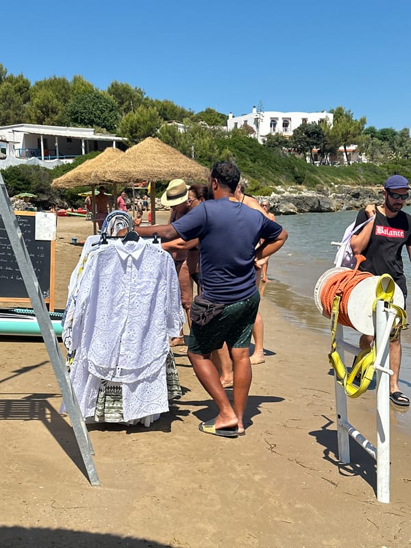Beachside shopping and snacks at a Peschici market stall