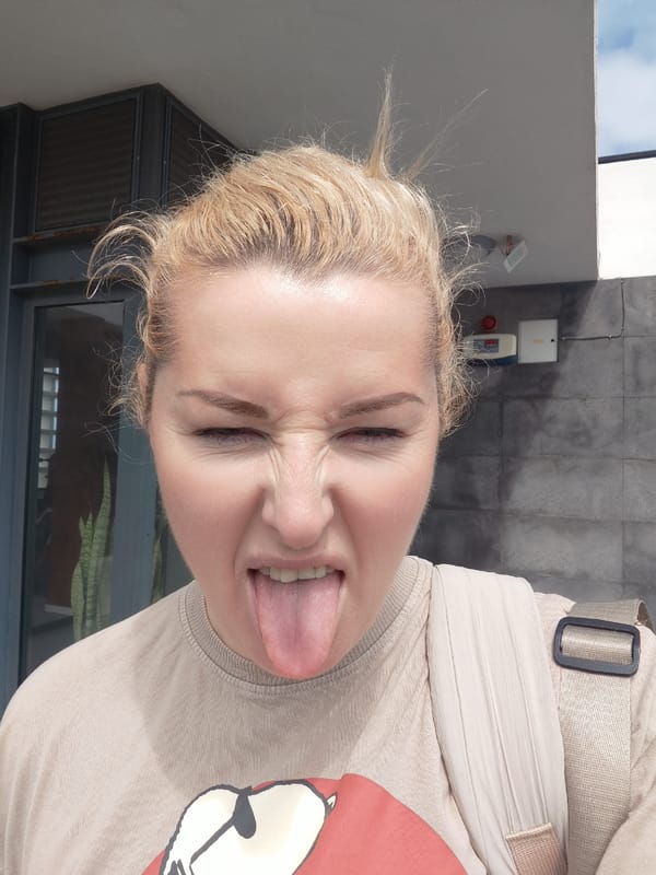 Woman makes playful face for photo in Ribeira Grande