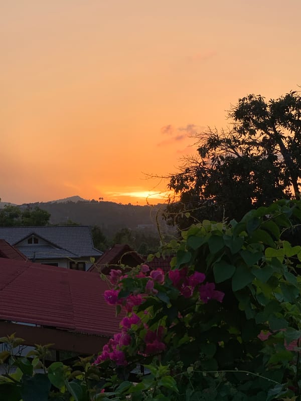 Sunset documented over mountainous landscape in บ้านบางรักษ์, Thailand