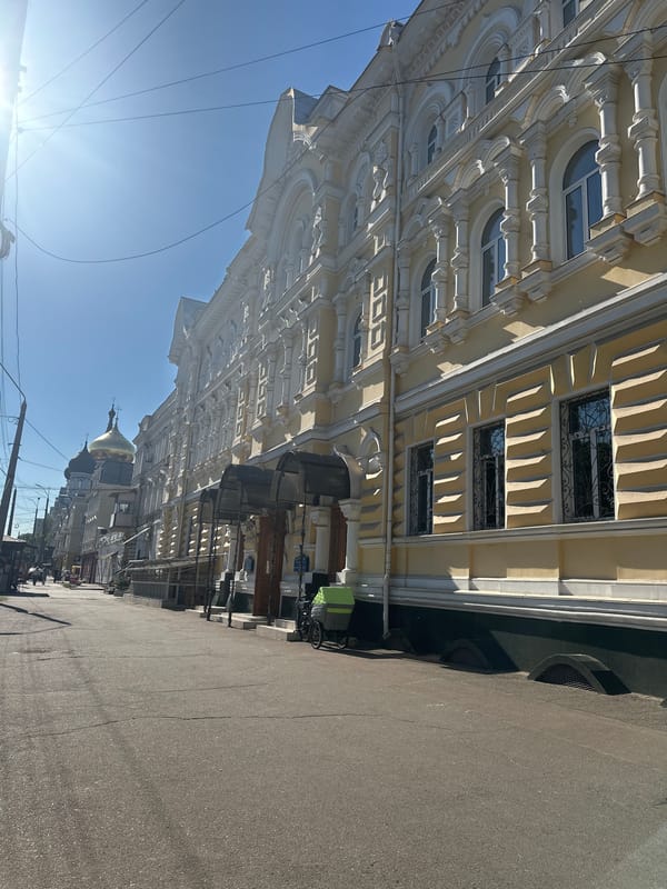 Sunny afternoon walking tour captures city streets, roses, bakeries