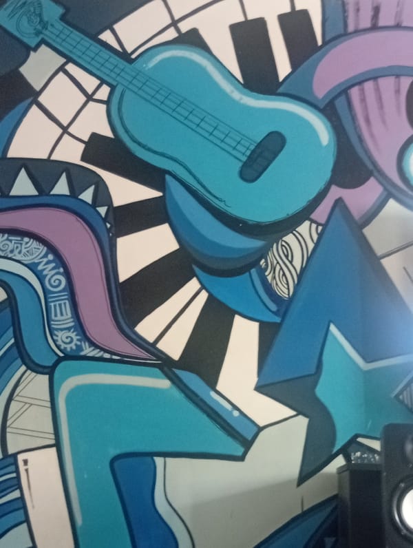 Musical mural and residential building observed in Abuja