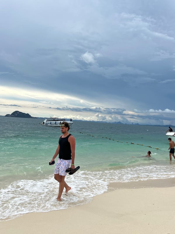Busy tropical beach morning at Phru Nai, Thailand