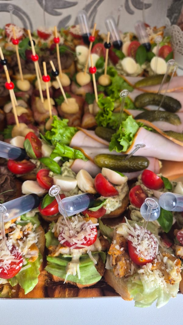 Catered appetizer spread documented at Krauja gathering