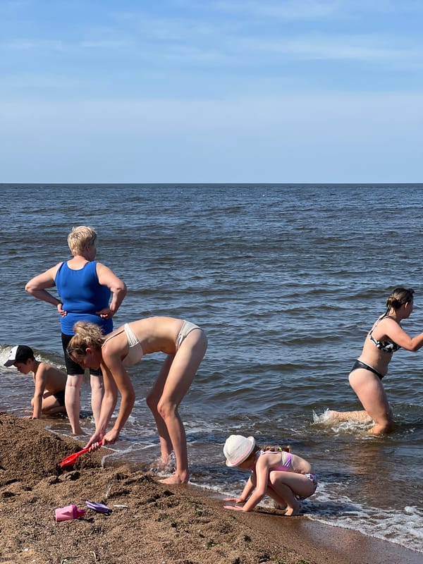 Beach morning: swimming, shoreline walks, and sea glass finds