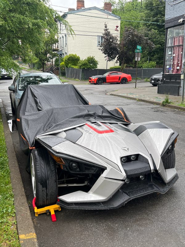 Covered Three-Wheeler Spotted Parked in Newburgh Street Scene