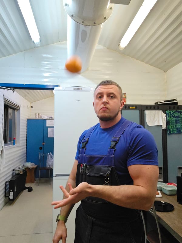 Worker prepares home-cooked meal in Russian kitchen