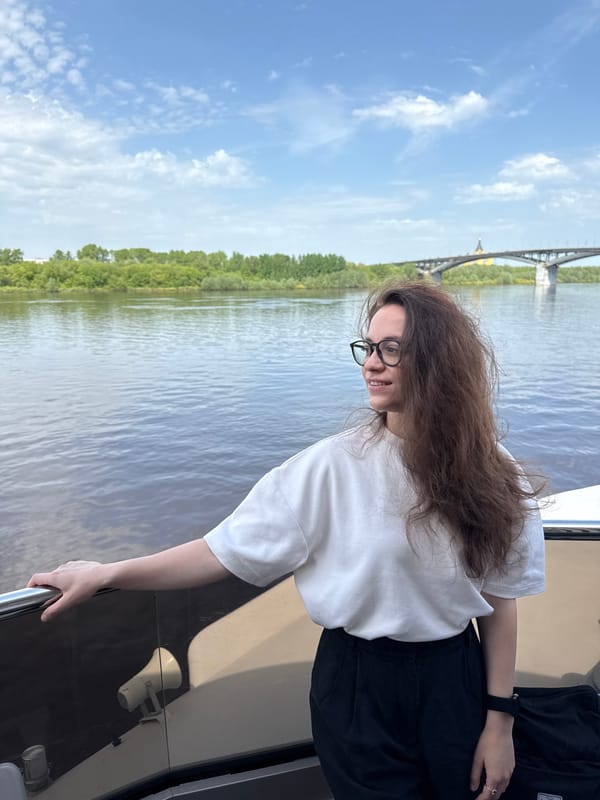 Woman photographed on Volga River boat near Nizhny Novgorod bridge