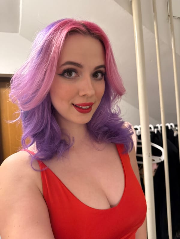 Woman with colorful hair documents afternoon in Zagreb selfies