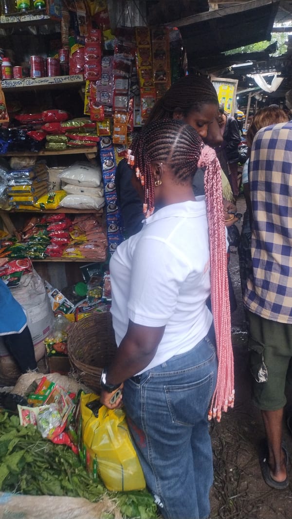 Afternoon street market life in a West African urban setting