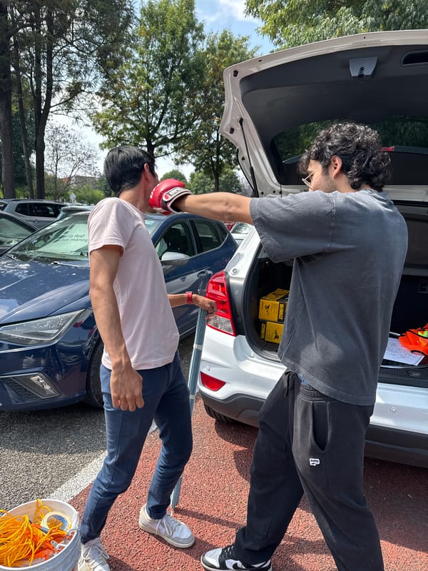 Men prepare project tools from SUV in Cholula