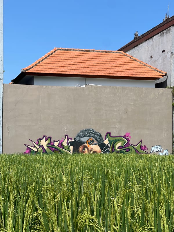 Graffiti art documented on concrete wall in Sukawati, Indonesia