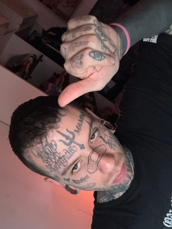 Tattooed man poses for selfies in Buenos Aires