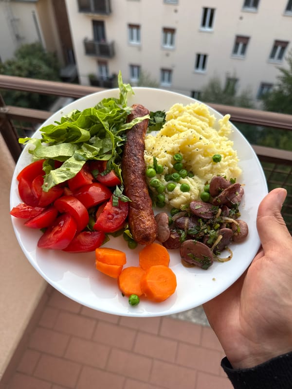 Dinner plate photographed against Milan cityscape backdrop
