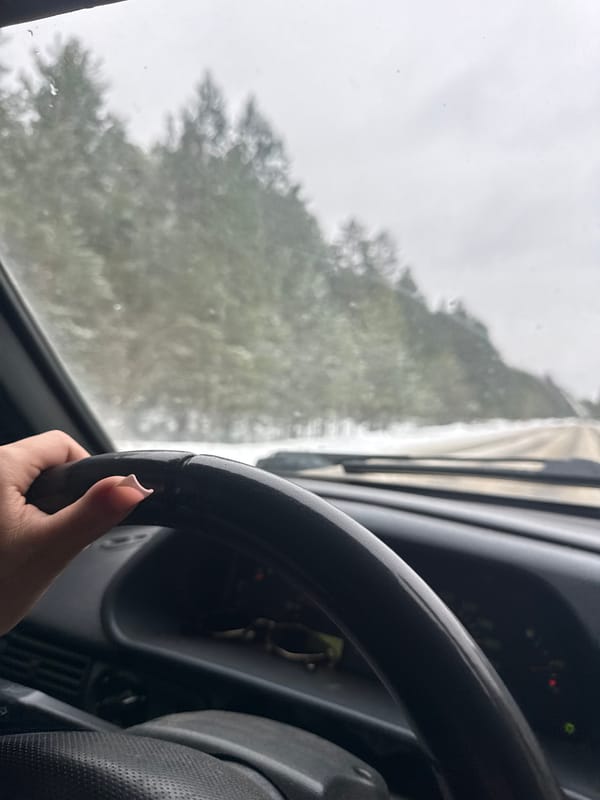 Driver navigates rainy conditions in Chaikovsky, Russia