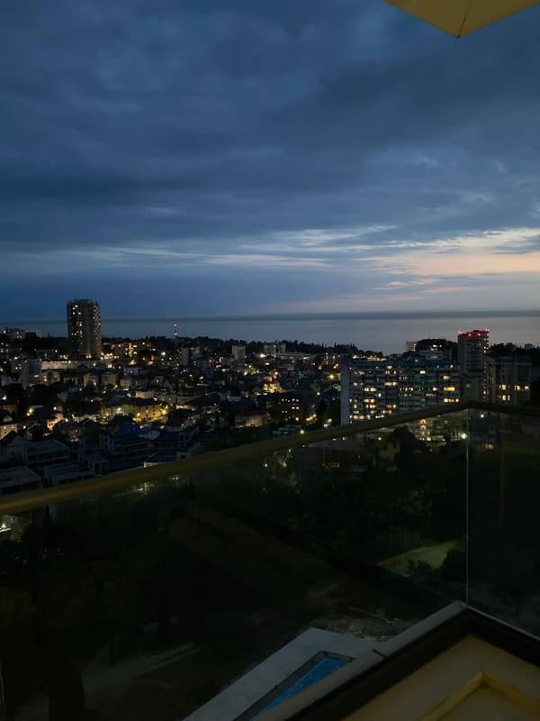Dusk cityscape observed from elevated position in Sochi, Russia