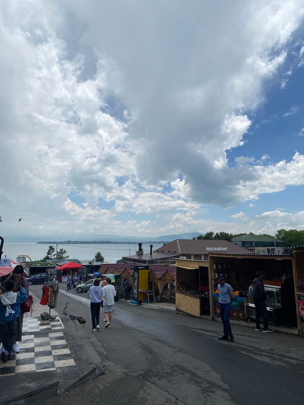 A busy morning at Lake Sevan: monastery, art, and rooftops
