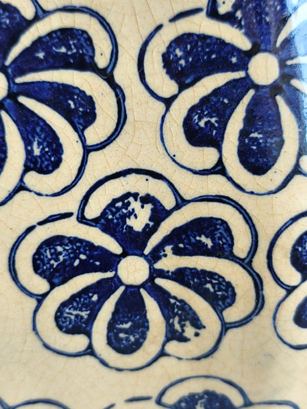 Eclectic close-ups from an Astana interior: tiles, a cutout, a snail