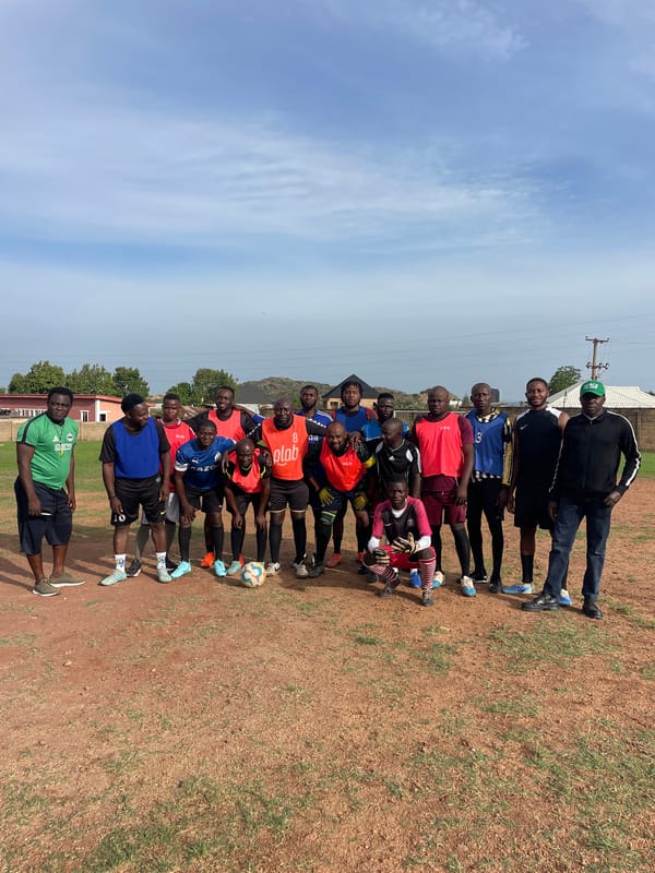 Soccer team trains in Jos, Nigeria amid everyday street life