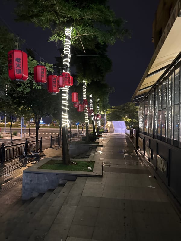 Haizhu District street at night, lanterns and local restaurants
