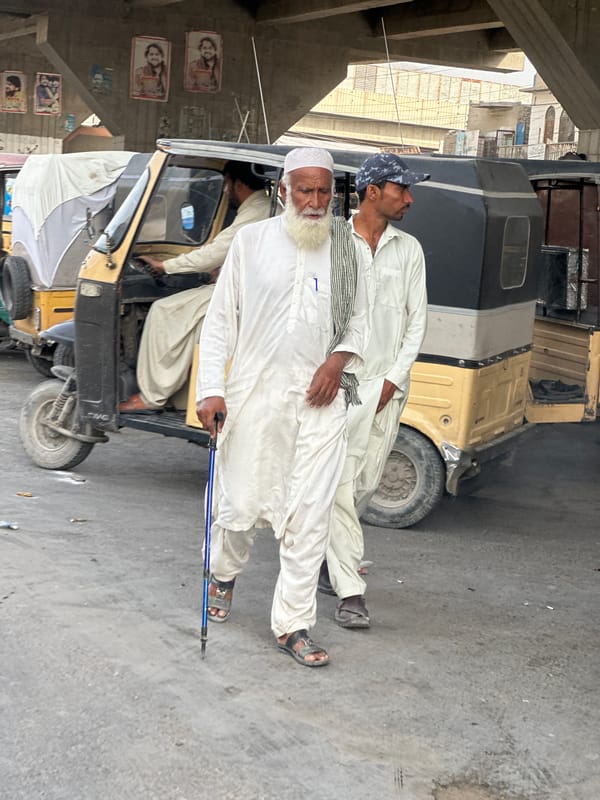Men in traditional dress gather on Quetta streets