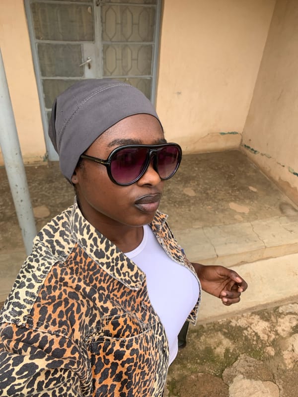 Portrait session captures stylishly dressed individual in Nigerian village