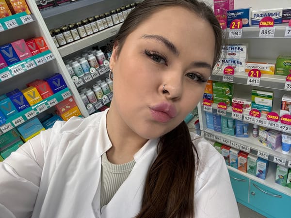 Woman takes selfie in Russian pharmacy