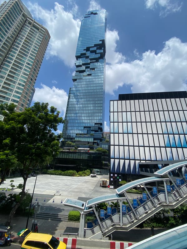Morning street life documented around Bangkok's MahaNakhon tower
