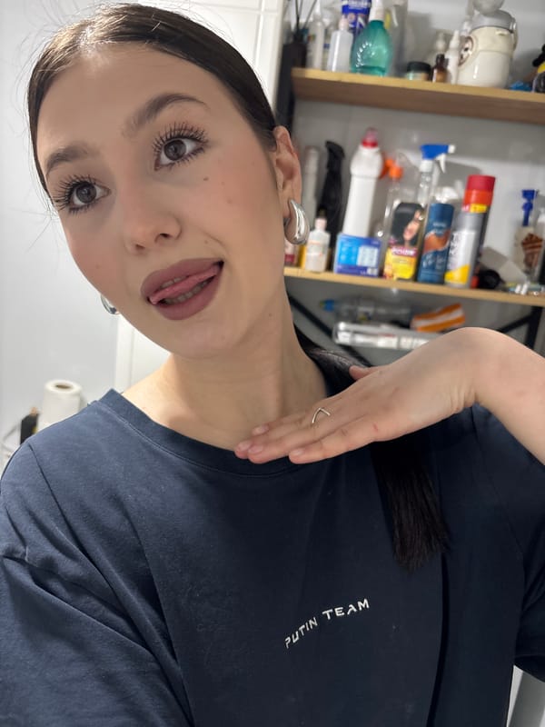 Woman applies makeup in Foki, Russia morning routine