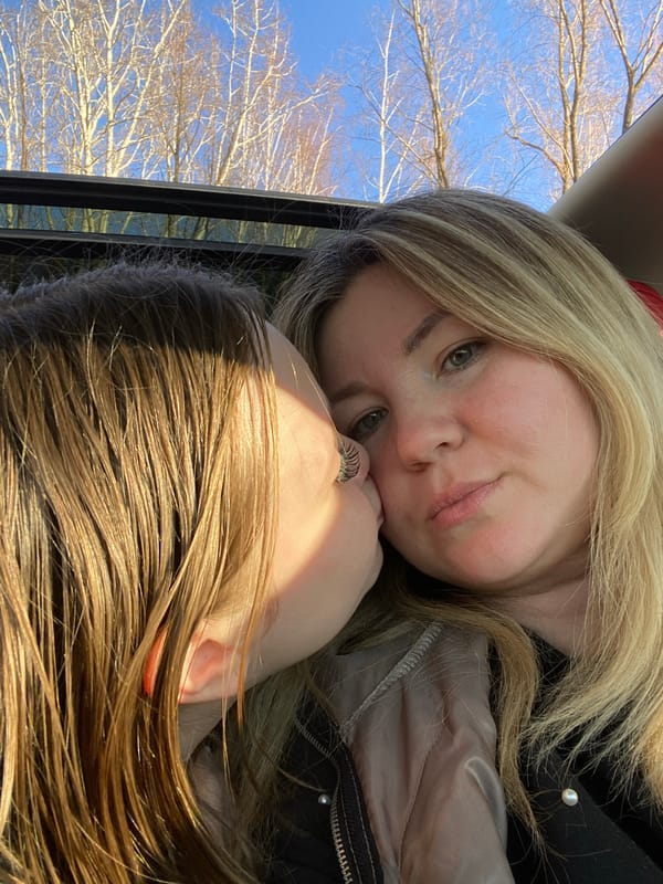 Mother daughter selfie session captured in Chaikovsky vehicle