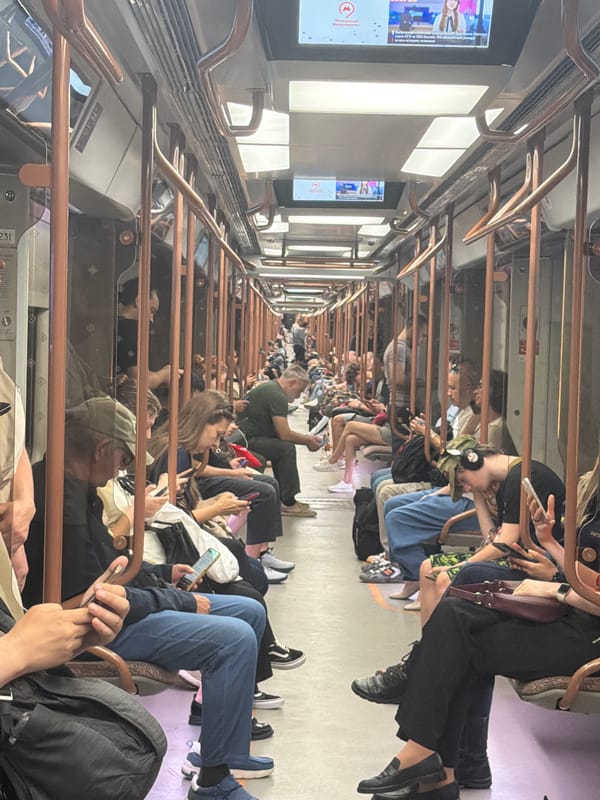 Inside a busy subway: passengers, tunnels, and escalators