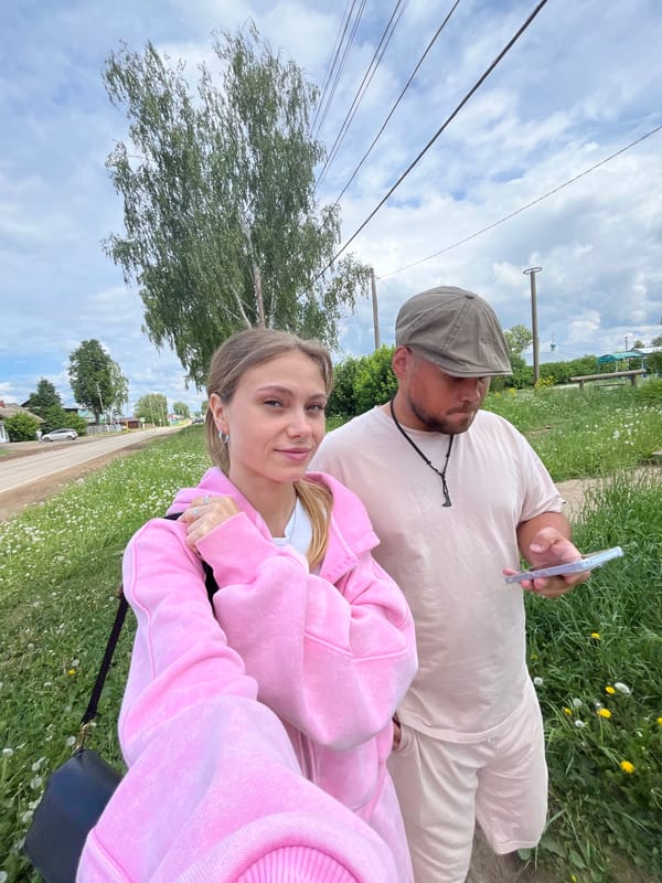 Couple takes selfies outdoors in Фоки, Russia