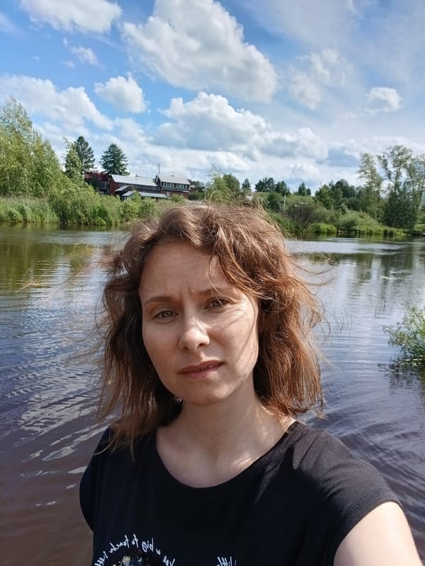 Calm riverside afternoon near Yekaterinburg on a clear summer day