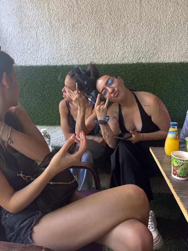 Young women gather at outdoor cafe in Karlovo
