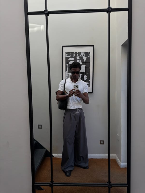 Hallway mirror selfie, sharp casual outfit in London