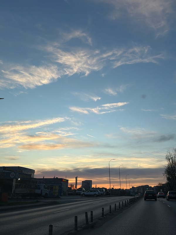 Vehicle captures cloudy sky view on Varna road