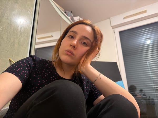 Woman takes selfies indoors in Strasbourg apartment