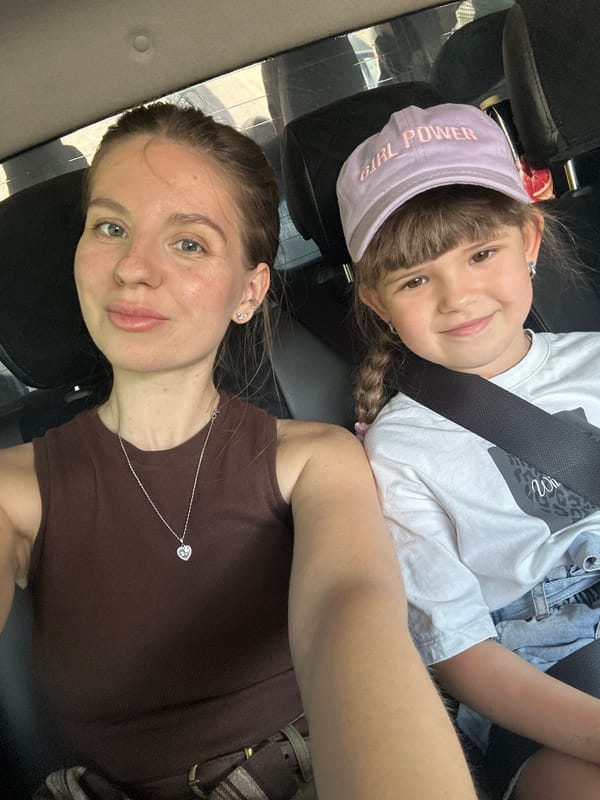 Two females take selfie in vehicle, Russia